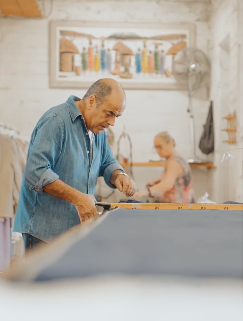 Man cutting fabric